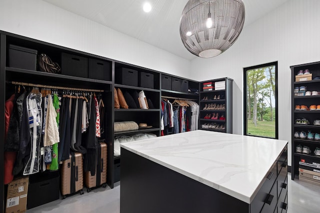 spacious closet featuring vaulted ceiling