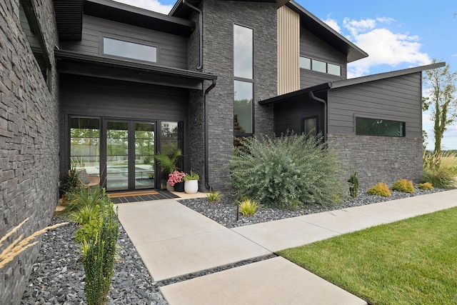 doorway to property featuring french doors