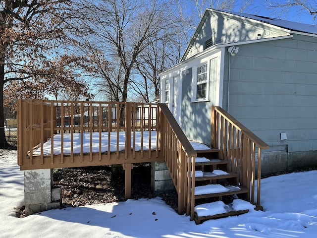 view of snow covered deck