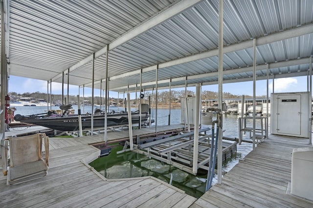 dock area featuring a water view