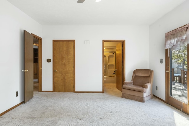 unfurnished room with light colored carpet