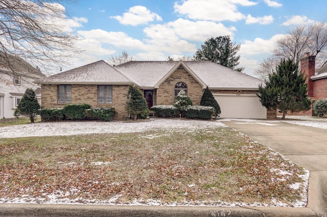 ranch-style home with a garage