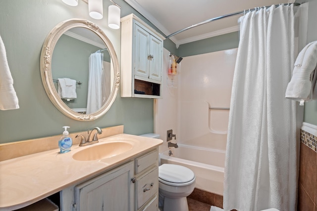 full bathroom featuring toilet, crown molding, vanity, and shower / bath combo with shower curtain