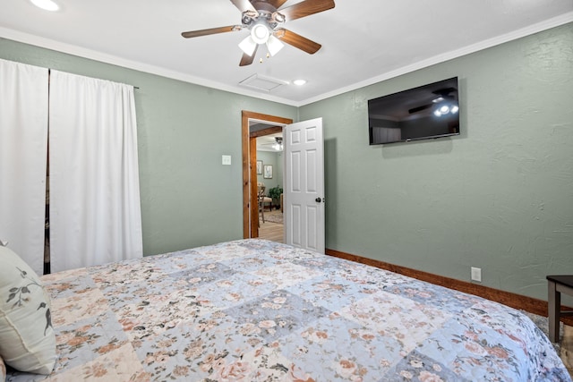 bedroom featuring ceiling fan and ornamental molding