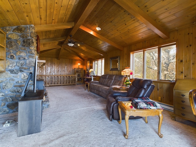 living room featuring wood walls, vaulted ceiling with beams, carpet floors, ceiling fan, and a baseboard heating unit