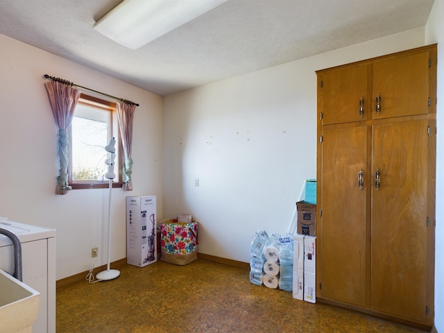 interior space with washer / clothes dryer