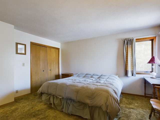 carpeted bedroom featuring a closet