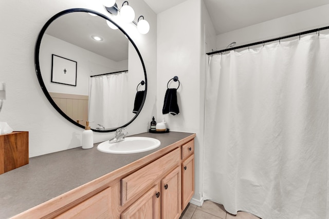 bathroom featuring vanity and tile patterned flooring