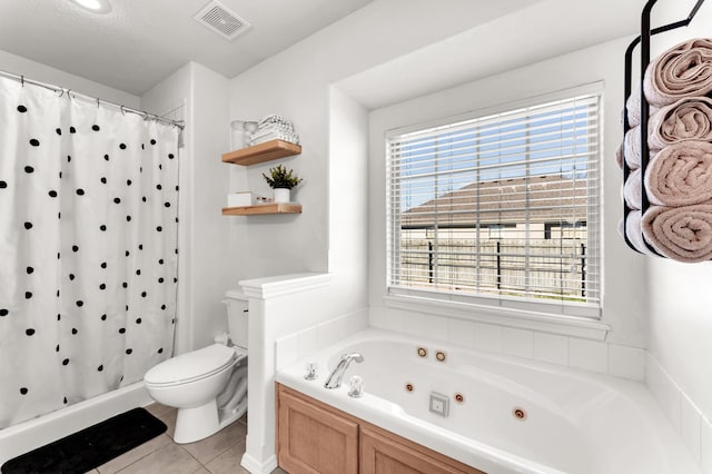 bathroom with plenty of natural light, toilet, shower with separate bathtub, and tile patterned flooring