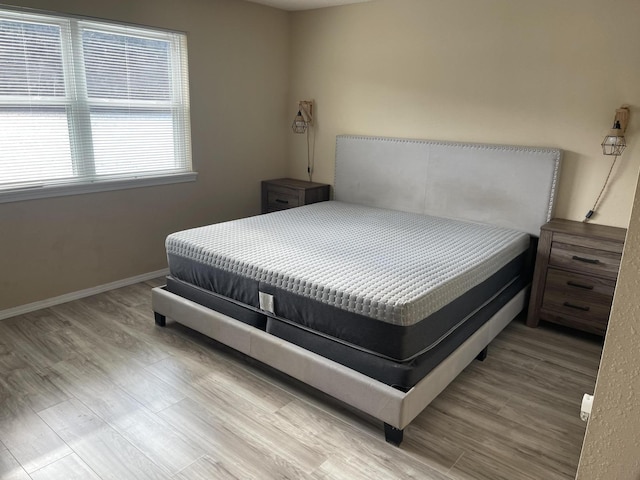 bedroom featuring light hardwood / wood-style floors