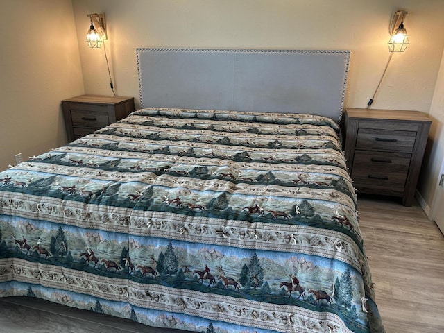 2529 State Highway 176 Unit 5, Rockaway Beach, MO 65740 - bedroom featuring light wood-style flooring