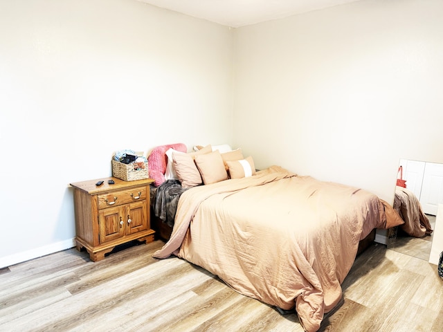 bedroom featuring light hardwood / wood-style floors