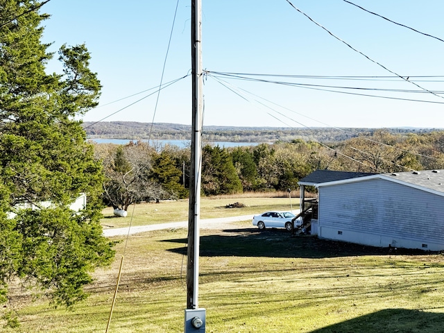 view of yard with a water view