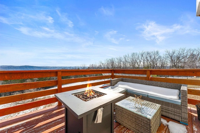 deck featuring a fire pit