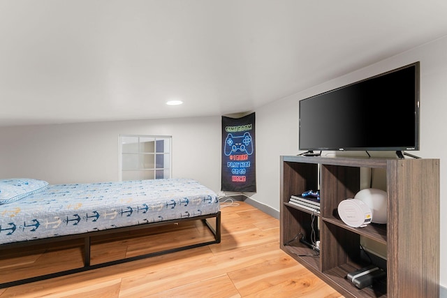 bedroom featuring hardwood / wood-style floors