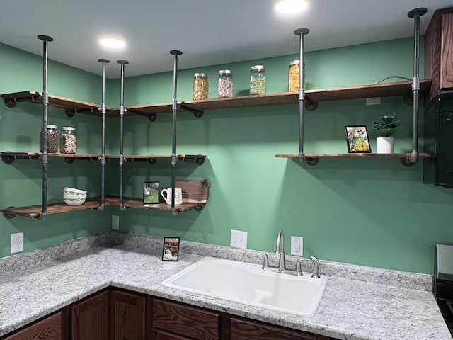 kitchen featuring sink and hanging light fixtures