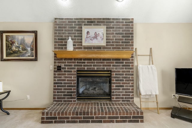 interior space featuring carpet and a fireplace