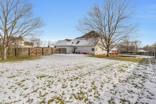 view of snow covered property