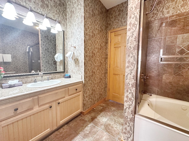 bathroom featuring shower / bathtub combination and vanity