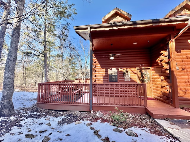 snow covered deck featuring ceiling fan