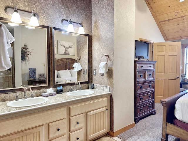 bathroom featuring vanity, lofted ceiling, and wood ceiling