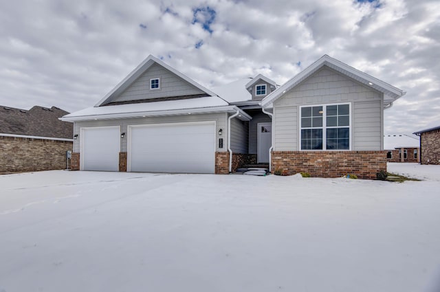 craftsman inspired home with a garage