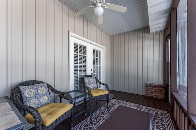 sunroom with ceiling fan and french doors