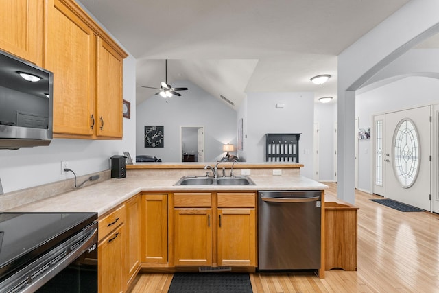 kitchen featuring dishwasher, sink, kitchen peninsula, black electric range, and ceiling fan