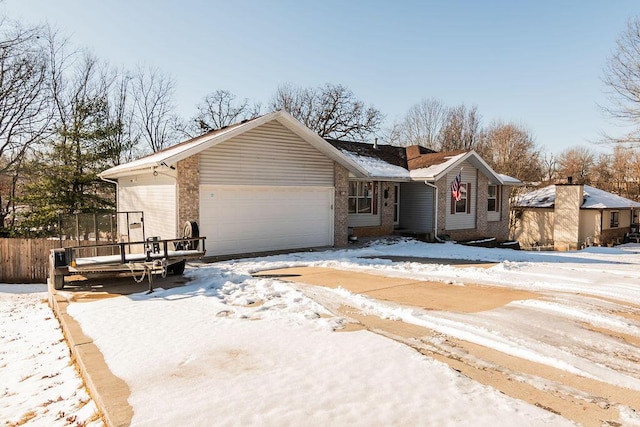 single story home with a garage