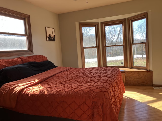 bedroom with light hardwood / wood-style flooring