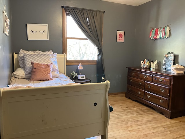 bedroom featuring light wood-type flooring