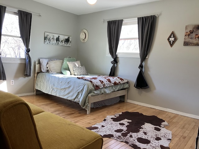 bedroom featuring hardwood / wood-style flooring