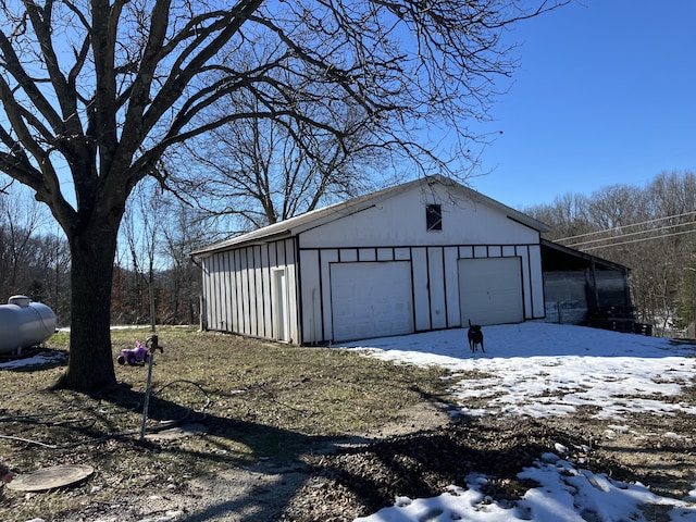 view of snow covered garage