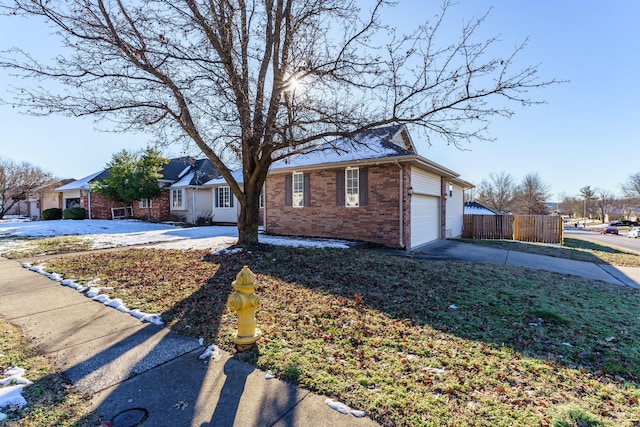 single story home featuring a garage