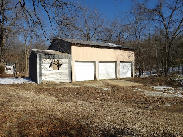 view of snow covered garage