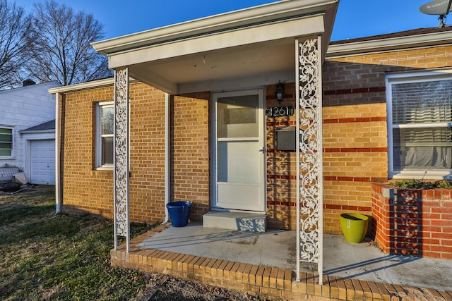 property entrance with a garage