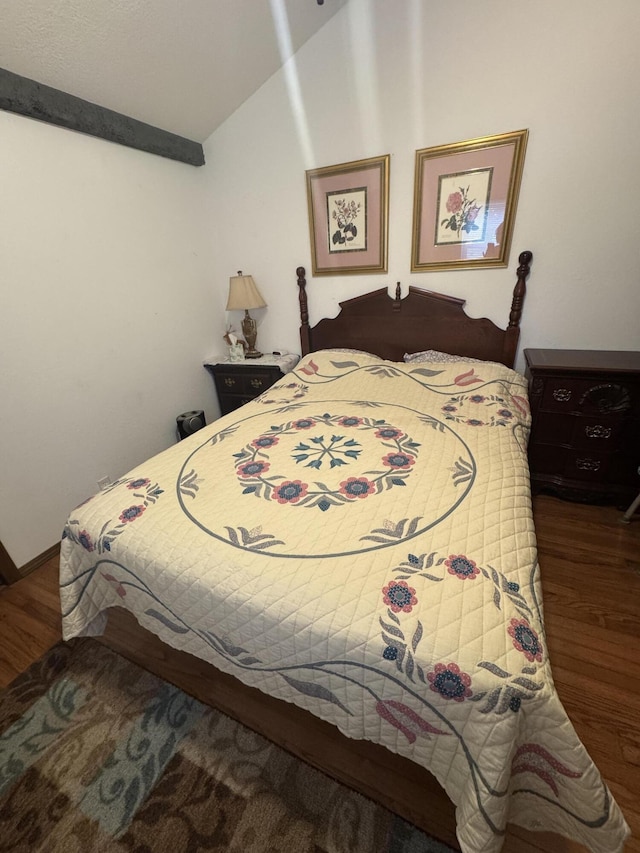 bedroom featuring dark wood-type flooring