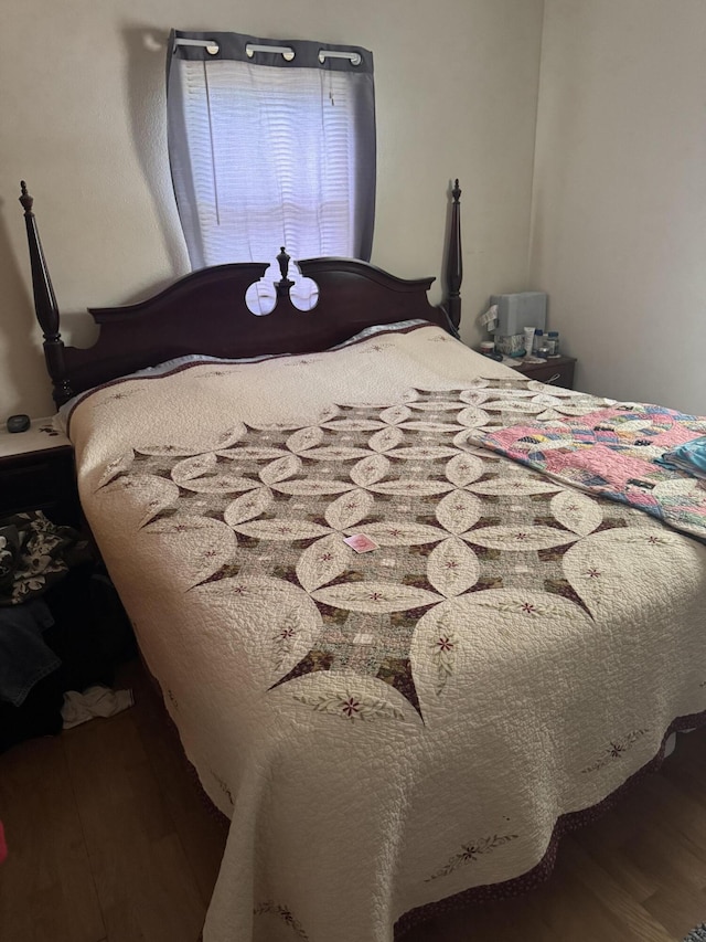 bedroom featuring hardwood / wood-style floors