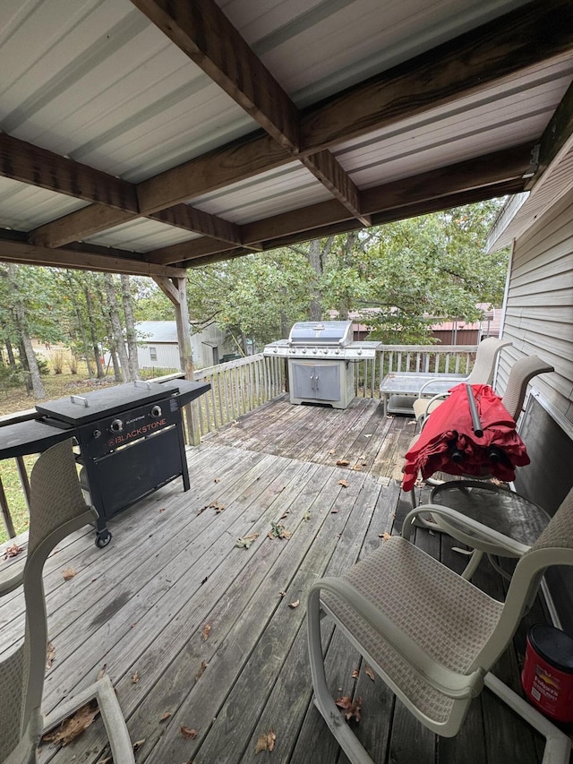 deck featuring a grill