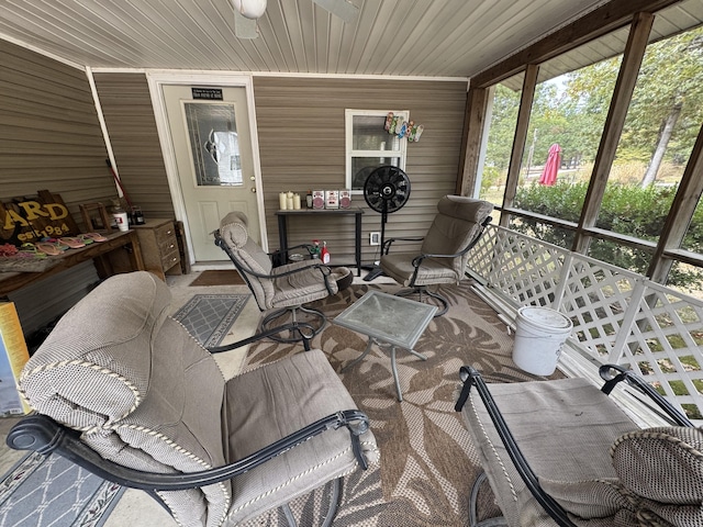 sunroom / solarium with ceiling fan