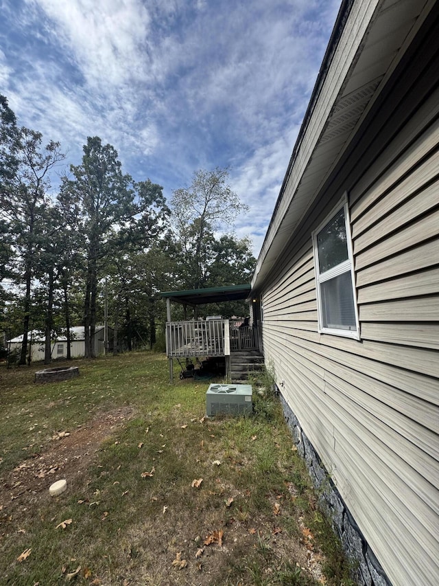 view of yard with a deck