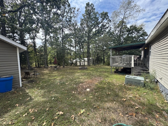 view of yard featuring a deck