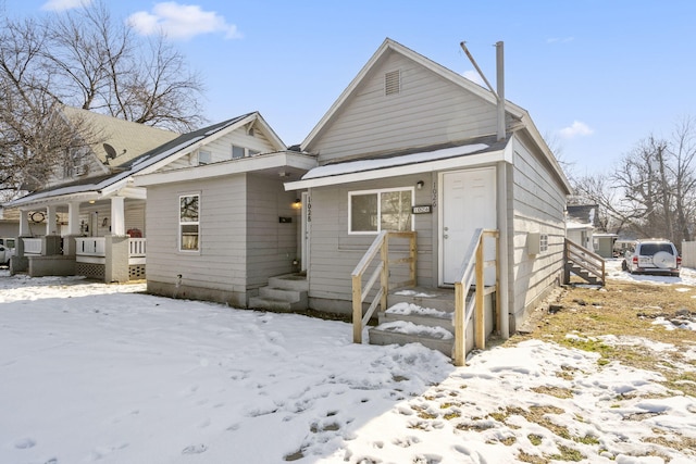 bungalow-style home featuring covered porch