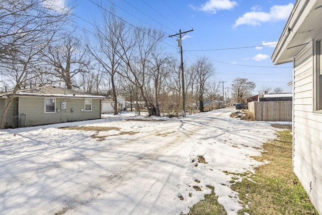 view of yard covered in snow