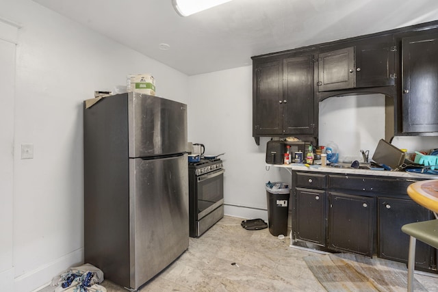 kitchen with stainless steel appliances and dark brown cabinets