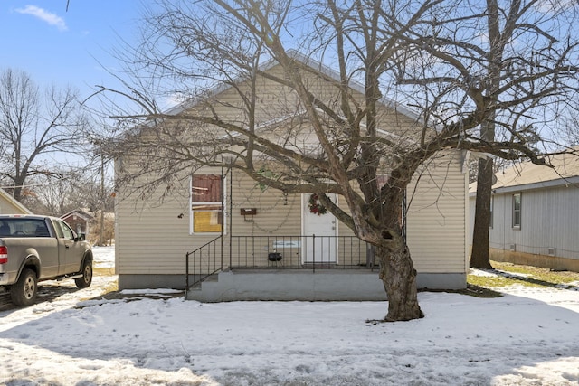 view of snow covered house