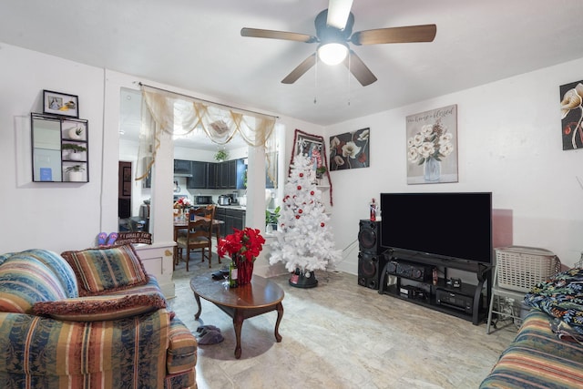 living room featuring ceiling fan