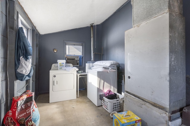 clothes washing area with washing machine and clothes dryer