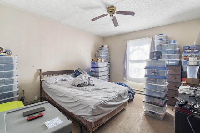 bedroom featuring a textured ceiling and ceiling fan