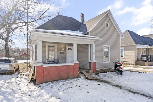 bungalow-style home with a porch